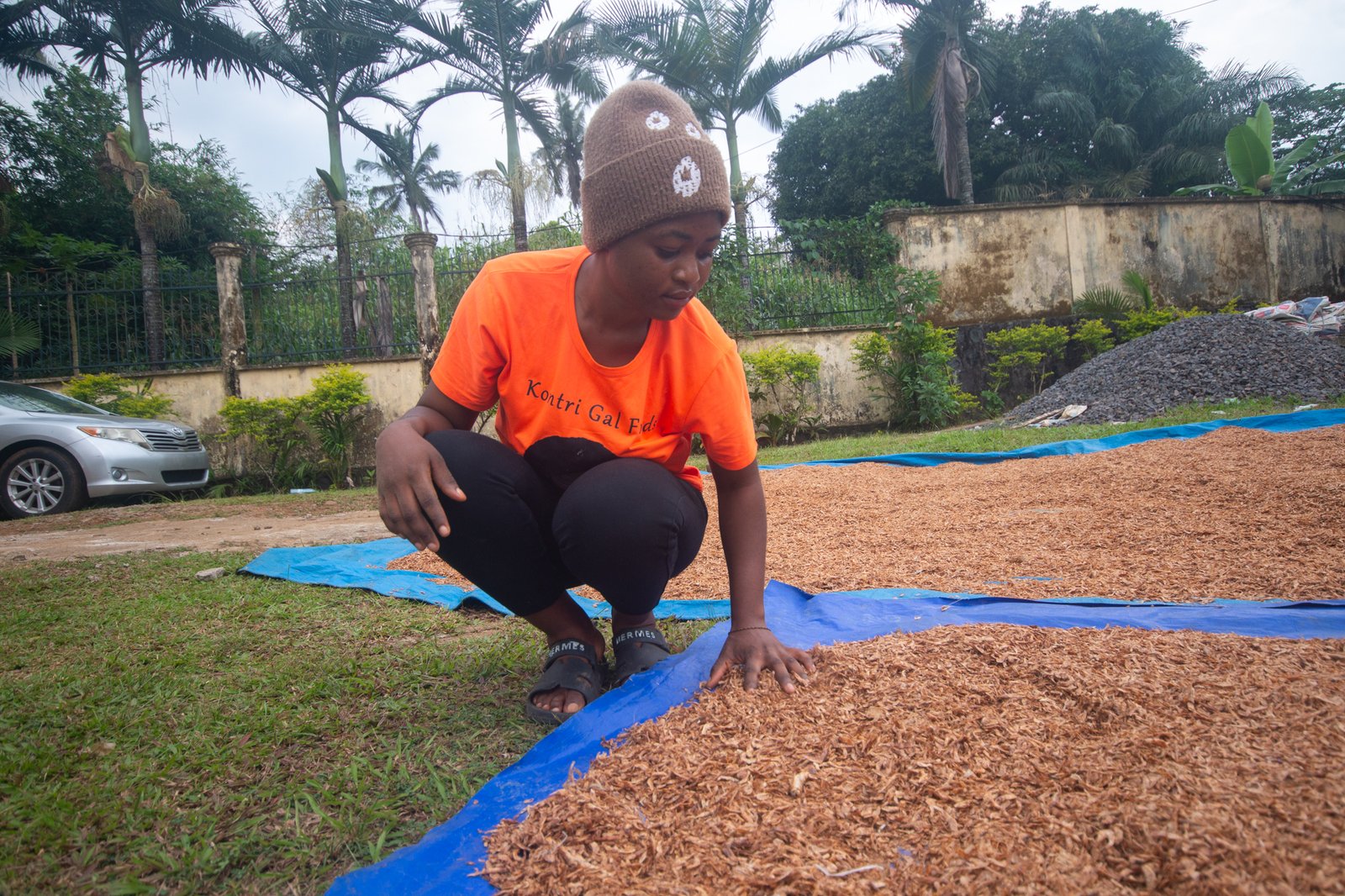 A Folefac team member tending freshly harvested ingredients